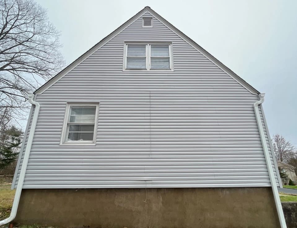 Beachwood Power Washing technician performing detailed house washing in Beachwood residential area