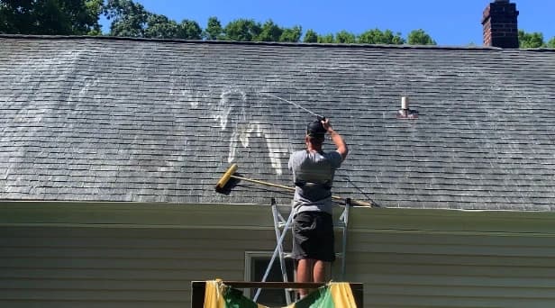 Before and after results of roof washing by Beachwood Power Washing in Beachwood